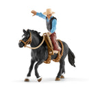 Schleich Western Cowboy in het Zadel