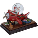 Kersttafereel met sneeuw, verlichting en muziek