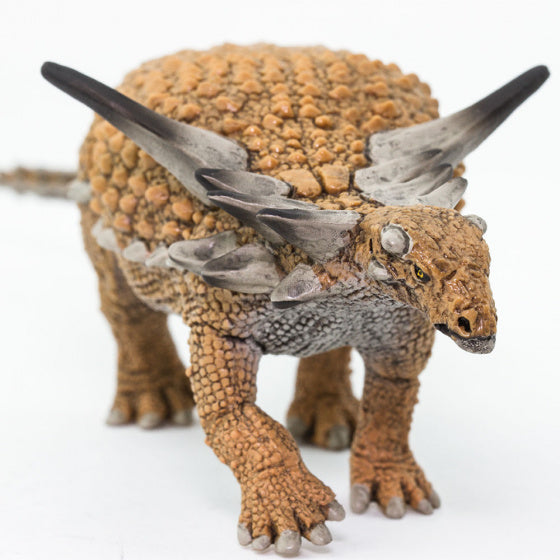 dinosaurus Sauropelta junior 18 cm rubber lichtbruin/grijs
